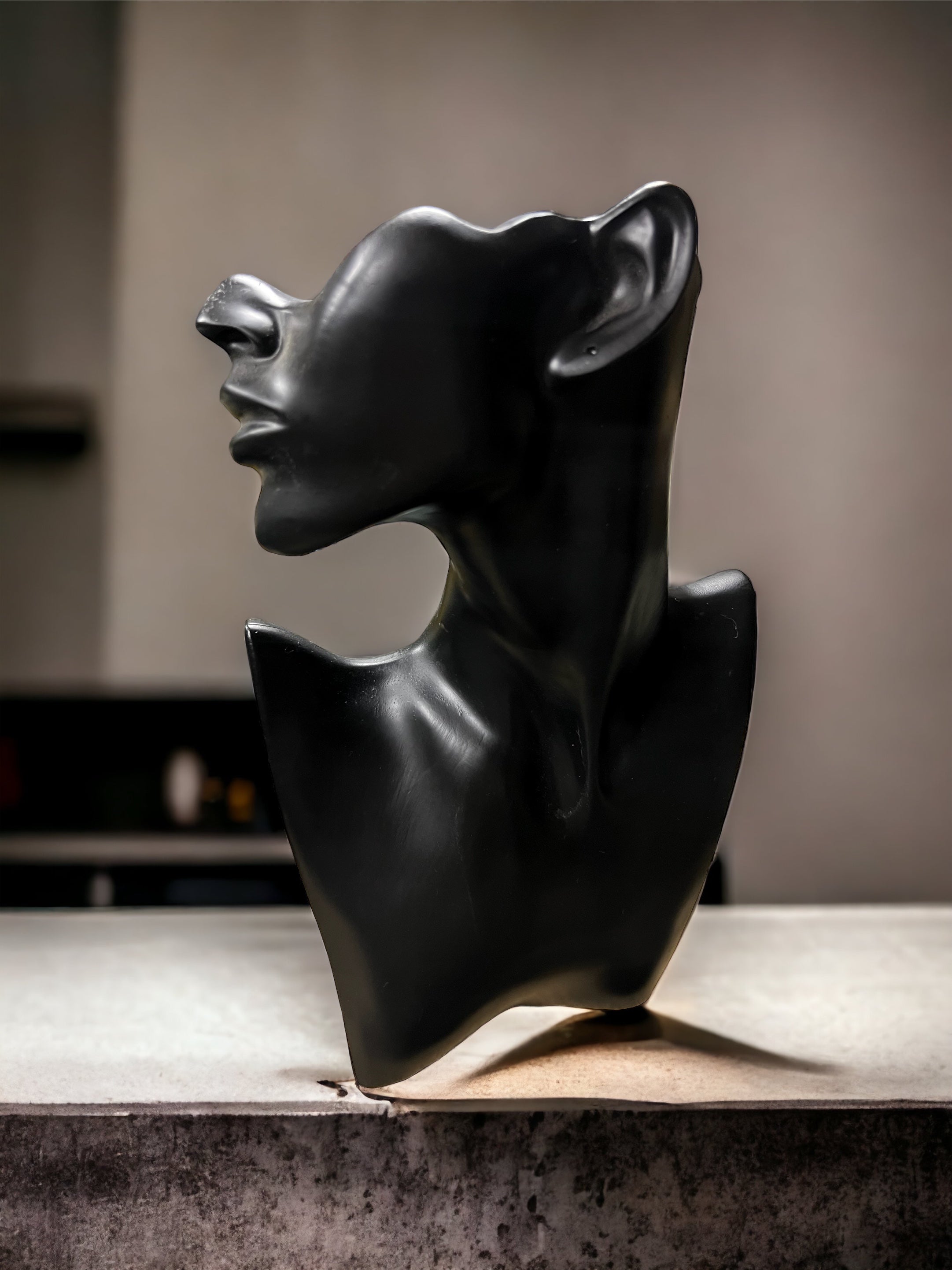 Black Side Profile Statue