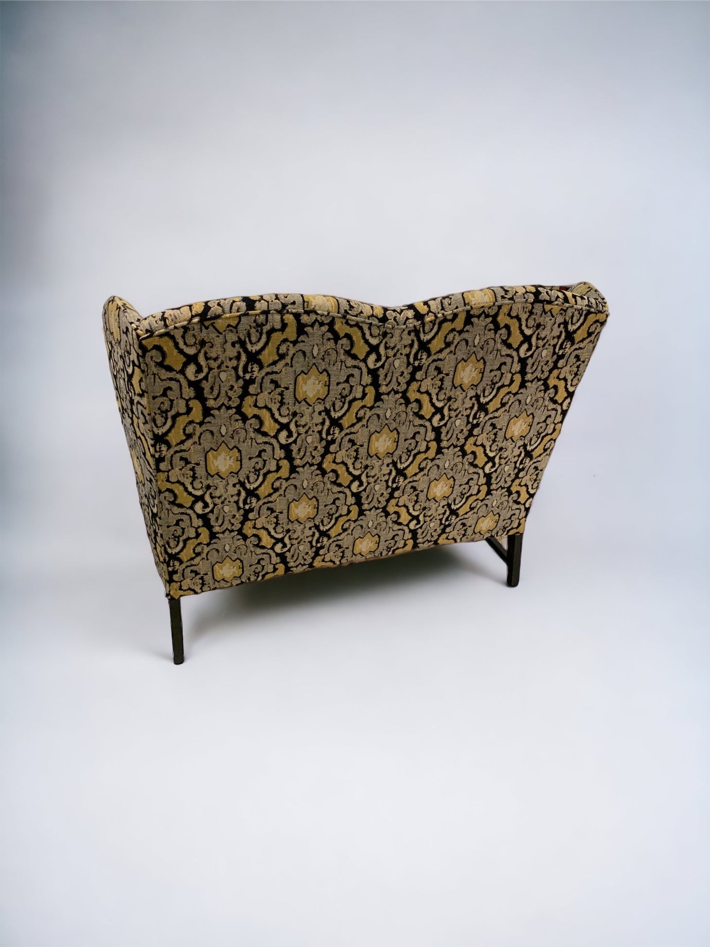 Early 20th Century Wingback Ikat Settee